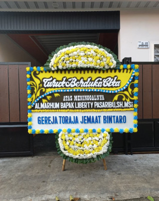 Papan Bunga Duka di Bosar Maligas
